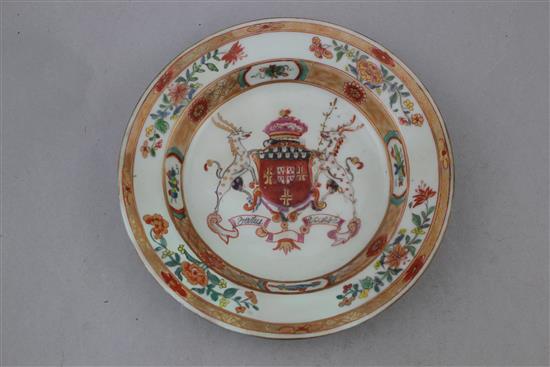 A Chinese export armorial bowl and similar saucer dish, c.1720 and a Chinese export armorial blue and white saucer dish, c.1790, 14.5cm